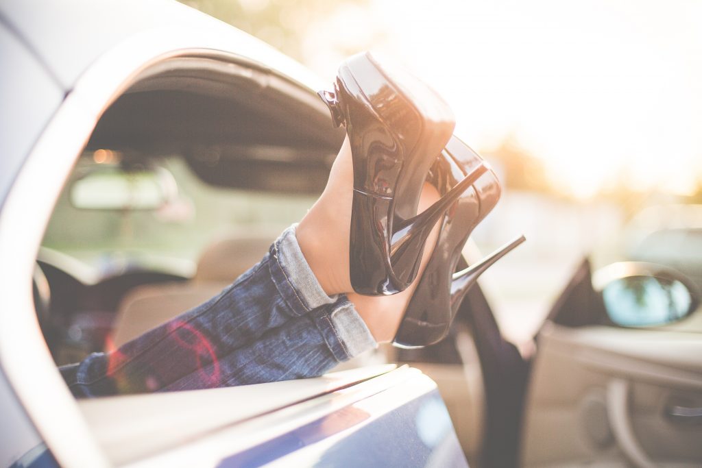 sexy-woman-legs-on-high-heels-out-of-car-windows-picjumbo-com
